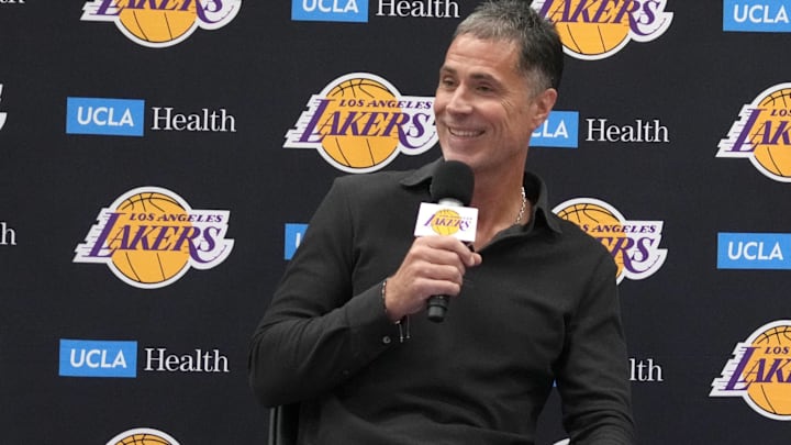 Los Angeles Lakers general manager Rob Pelinka (left) and coach JJ Redick at a press conference at UCLA Health Training Center.