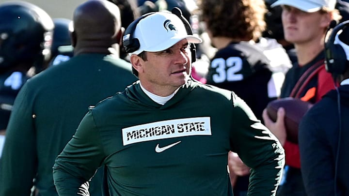 Nov 2, 2024; East Lansing, Michigan, USA;  Michigan State Spartans head coach Jonathan Smith looks over his sidelines during the first quarter against the Indiana Hoosiers at Spartan Stadium. Mandatory Credit: Dale Young-Imagn Images