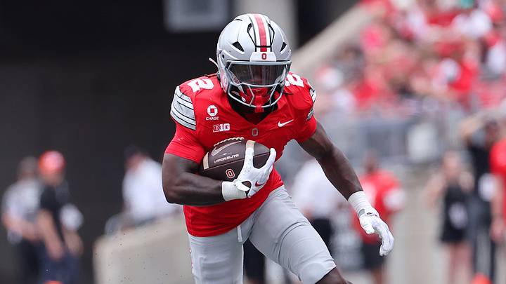 Sep 5, 2026; Columbus, Ohio, USA;  Ohio State Buckeyes running back Legend Bey (2) runs for a touchdown during the fourth quarter against the Ball State Cardinals at Ohio Stadium.  Mandatory Credit: Joseph Maiorana-Imagn Images