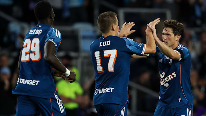Robin Lod (middle) and Wil Trapp (right) will look to help Minnesota adapt to life after Tani Oluwaseyi. 