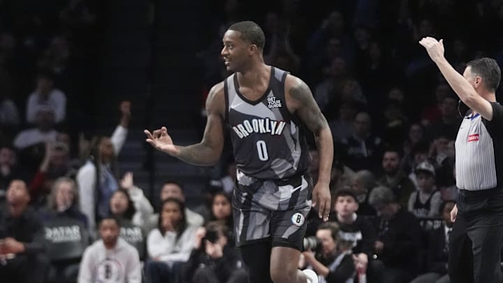 Apr 6, 2025; Brooklyn, New York, USA; Brooklyn Nets forward Dariq Whitehead (0) reacts to making a three point shot against the Toronto Raptors during the first half at Barclays Center. Mandatory Credit: Gregory Fisher-Imagn Images