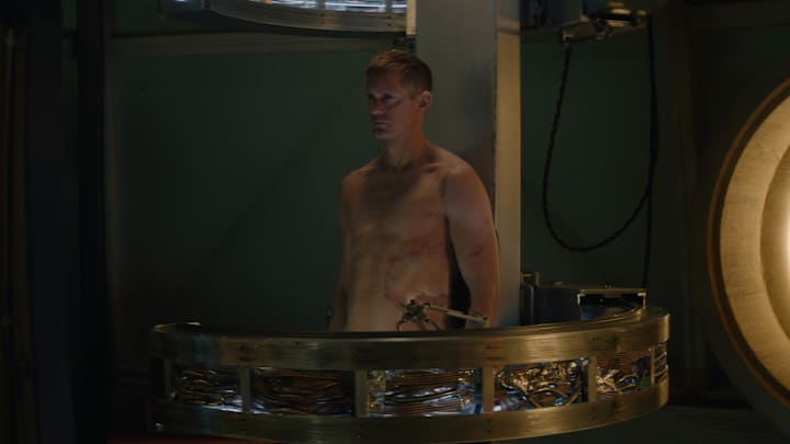 Alexander Skarsgård in "Murderbot," premiering May 16, 2025 on Apple TV+.