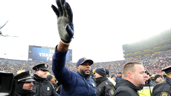 Michigan Wolverines head coach Sherrone Moore tells his players to get back following the NCAA football game against the Ohio State Buckeyes at Michigan Stadium in Ann Arbor, Mich. on Nov. 29, 2025. Ohio State won 27-9. Michigan Wolverines head coach Sherrone Moore tells his players to get back following the NCAA football game against the Ohio State Buckeyes at Michigan Stadium in Ann Arbor, Mich. on Nov. 29, 2025. Ohio State won 27-9.