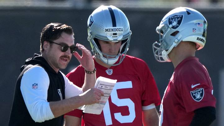 Jun 9, 2026; Henderson, NV, USA; Las Vegas Raiders offensive coordinator Andrew Janocko (left) talks with quarterbacks Fernando Mendoza (15) and Kirk Cousins (8) during minicamp at Intermountain Health Performance Center. Mandatory Credit: Kirby Lee-Imagn Images