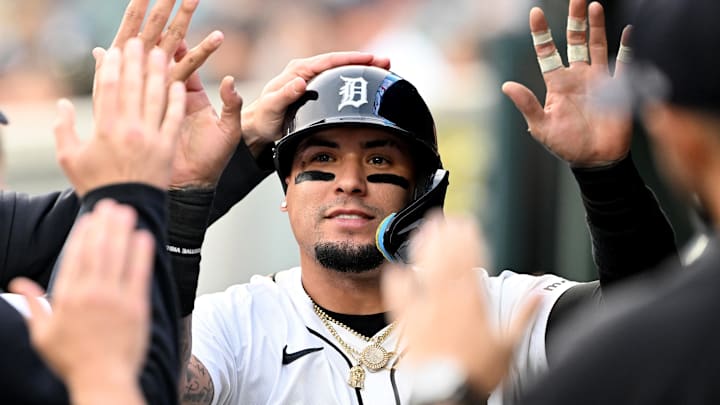 Detroit Tigers shortstop Javier Baez (28) celebrates in the dugout after scoring a run against the Chicago Cubs in the fifth inning at Comerica Park. 