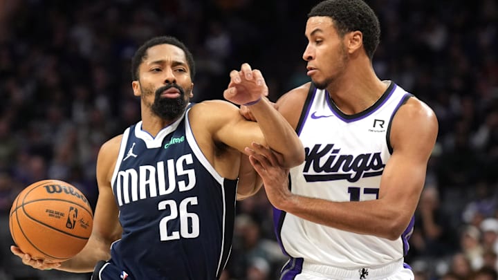 Dec 30, 2024; Sacramento, California, USA; Dallas Mavericks guard Spencer Dinwiddie (26) drives against Sacramento Kings forward Keegan Murray (right) during the second quarter at Golden 1 Center. Mandatory Credit: Darren Yamashita-Imagn Images Dec 30, 2024; Sacramento, California, USA; Dallas Mavericks guard Spencer Dinwiddie (26) drives against Sacramento Kings forward Keegan Murray (right) during the second quarter at Golden 1 Center. Mandatory Credit: Darren Yamashita-Imagn Images