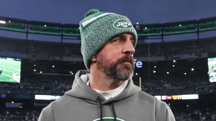 Dec 24, 2023; East Rutherford, New Jersey, USA; New York Jets quarterback Aaron Rodgers (8) on the field after the game against the Washington Commanders at MetLife Stadium. Dec 24, 2023; East Rutherford, New Jersey, USA; New York Jets quarterback Aaron Rodgers (8) on the field after the game against the Washington Commanders at MetLife Stadium.