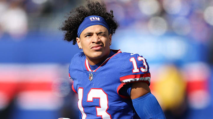 Oct 22, 2023; East Rutherford, New Jersey, USA; New York Giants wide receiver Jalin Hyatt (13) looks on during the first half against the Washington Commanders at MetLife Stadium. Mandatory Credit: Vincent Carchietta-Imagn Images