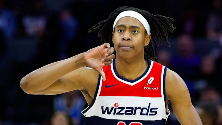 Jan 16, 2026; Sacramento, California, USA; Washington Wizards guard Tre Johnson (12) reacts after scoring during the third quarter against the Sacramento Kings at Golden 1 Center. Mandatory Credit: Sergio Estrada-Imagn Images