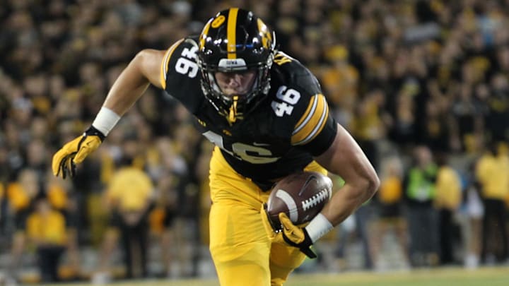 Sep 19, 2015; Iowa City, IA, USA; Iowa Hawkeyes tight end George Kittle (46) escapes a tackle by Pittsburgh Panthers defensive back Lafayette Pitts (6) at Kinnick Stadium. Mandatory Credit: Reese Strickland-Imagn Images Sep 19, 2015; Iowa City, IA, USA; Iowa Hawkeyes tight end George Kittle (46) escapes a tackle by Pittsburgh Panthers defensive back Lafayette Pitts (6) at Kinnick Stadium. Mandatory Credit: Reese Strickland-Imagn Images