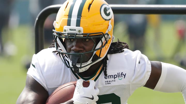 Green Bay Packers running back Israel Abanikanda runs through a drill at training camp on Aug. 1.