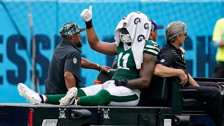New York Jets linebacker Jermaine Johnson (11) exits the field after an injury during the third quarter against the Tennessee Titans at Nissan Stadium in Nashville, Tenn., Sunday, Sept. 15, 2024. New York Jets linebacker Jermaine Johnson (11) exits the field after an injury during the third quarter against the Tennessee Titans at Nissan Stadium in Nashville, Tenn., Sunday, Sept. 15, 2024.