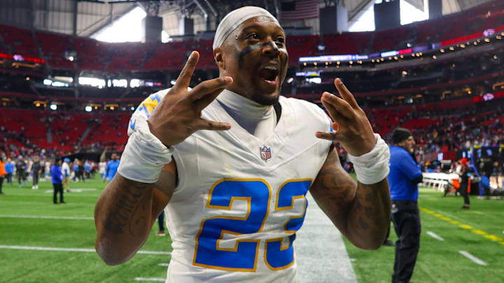 Dec 1, 2024; Atlanta, Georgia, USA; Los Angeles Chargers safety Tony Jefferson (23) celebrates after a victory over the Atlanta Falcons at Mercedes-Benz Stadium. Mandatory Credit: Brett Davis-Imagn Images
