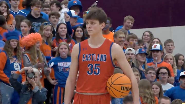 Eastland (Ill.) Parker Krogman holds ball in the first quarter of his team's 36-31 win in sectional final Friday March 7.  