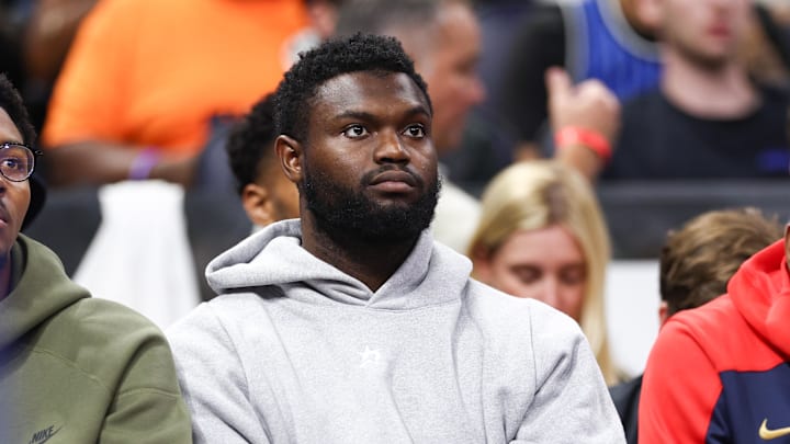 New Orleans Pelicans forward Zion Williamson (1) looks on from the bench against the Orlando Magic in the third quarter at Kia Center. 