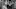 bespectacled balding man standing next to a valet in a top hat bespectacled balding man standing next to a valet in a top hat
