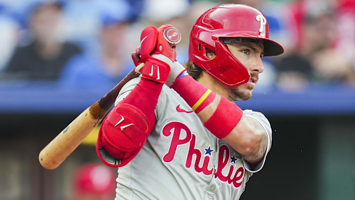 Aug 24, 2024; Kansas City, Missouri, USA; Philadelphia Phillies second baseman Bryson Stott (5) bats during the fourth inning against the Kansas City Royals at Kauffman Stadium