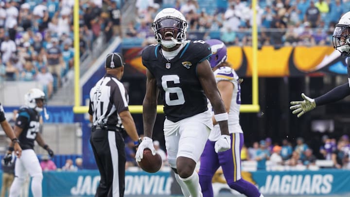 Nov 10, 2024; Jacksonville, Florida, USA; Jacksonville Jaguars safety Darnell Savage (6) celebrates an interception with safety Antonio Johnson (26) against the Minnesota Vikings during the third quarter at EverBank Stadium. Mandatory Credit: Morgan Tencza-Imagn Images Nov 10, 2024; Jacksonville, Florida, USA; Jacksonville Jaguars safety Darnell Savage (6) celebrates an interception with safety Antonio Johnson (26) against the Minnesota Vikings during the third quarter at EverBank Stadium. Mandatory Credit: Morgan Tencza-Imagn Images