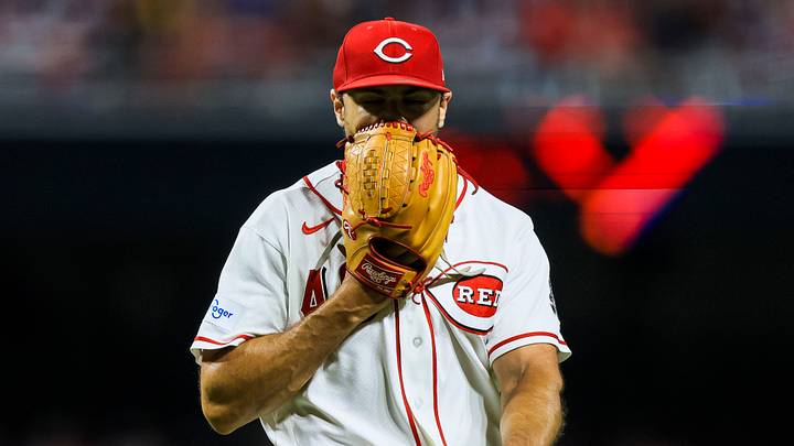 Cincinnati Reds relief pitcher Brock Burke (49) reacts
