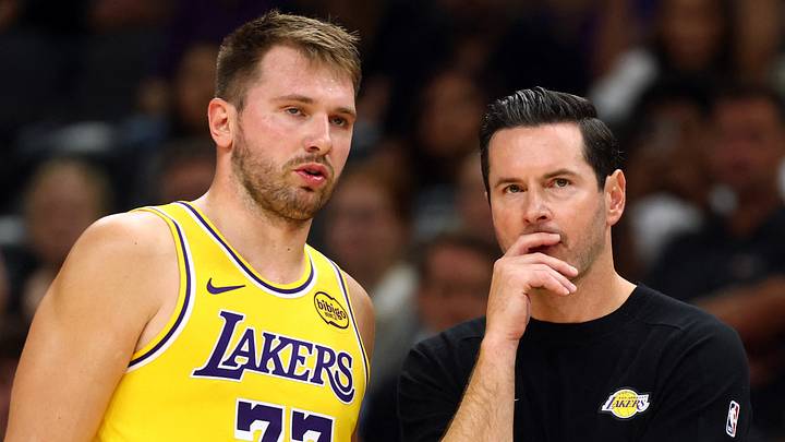 Oct 14, 2025; Phoenix, Arizona, USA; Los Angeles Lakers guard Luka Doncic (77) with head coach JJ Redick against the Phoenix Suns during an NBA preseason game at Mortgage Matchup Center. Mandatory Credit: Mark J. Rebilas-Imagn Images Oct 14, 2025; Phoenix, Arizona, USA; Los Angeles Lakers guard Luka Doncic (77) with head coach JJ Redick against the Phoenix Suns during an NBA preseason game at Mortgage Matchup Center. Mandatory Credit: Mark J. Rebilas-Imagn Images