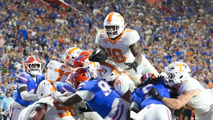 Tennessee running back DeSean Bishop (18) scores a touchdown during the NCAA college football game against Florida on November 22, 2025, in Gainesville, Florida.