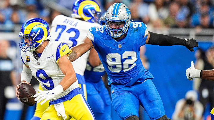 Detroit Lions defensive end Marcus Davenport (92) pressures Los Angeles Rams quarterback Matthew Stafford (9) 