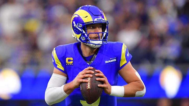 Jan 4, 2026; Inglewood, California, USA;  Los Angeles Rams quarterback Matthew Stafford (9) looks downfield against the Arizona Cardinals during the second half at SoFi Stadium. Mandatory Credit: Gary A. Vasquez-Imagn Images
