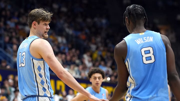 Jan 17, 2026; Berkeley, California, USA; North Carolina Tar Heels center Henri Veesaar (13) and forward Caleb Wilson (8) slap hands during the second half against the California Golden Bears at Haas Pavilion. Mandatory Credit: Darren Yamashita-Imagn Images