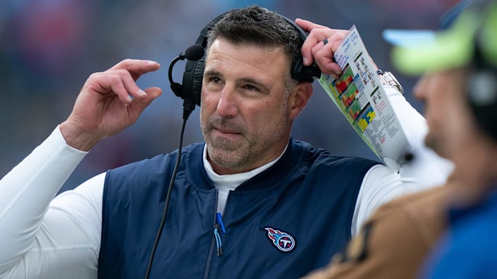Tennessee Titans head coach Mike Vrabel pulls off his headset during their game against the Carolina Panthers at Nissan Stadium in Nashville, Tenn., Sunday, Nov. 26, 2023.