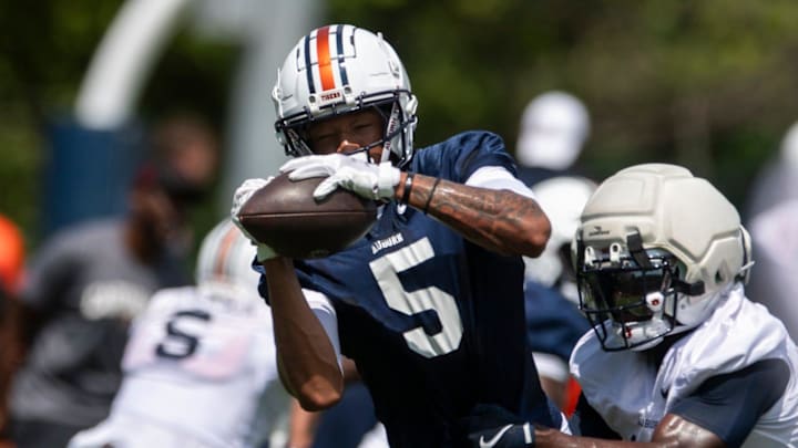 Auburn Tigers wide receiver Horatio Fields (5) catches a pass during practice at Woltosz Football Performance Center in Auburn, Ala. on Thursday, Aug. 14, 2025. Auburn Tigers wide receiver Horatio Fields (5) catches a pass during practice at Woltosz Football Performance Center in Auburn, Ala. on Thursday, Aug. 14, 2025.