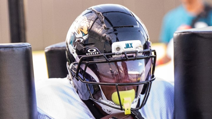 Jacksonville Jaguars running back Travis Etienne Jr. (1) runs through a gauntlet during the Jaguars 14th NFL training camp session at Miller Electric Center Tuesday August 12, 2025 in Jacksonville, Fla. The Jaguars travel to New Orleans to play the Saints this Sunday in their second preseason game. [Doug Engle/Florida Times-Union]