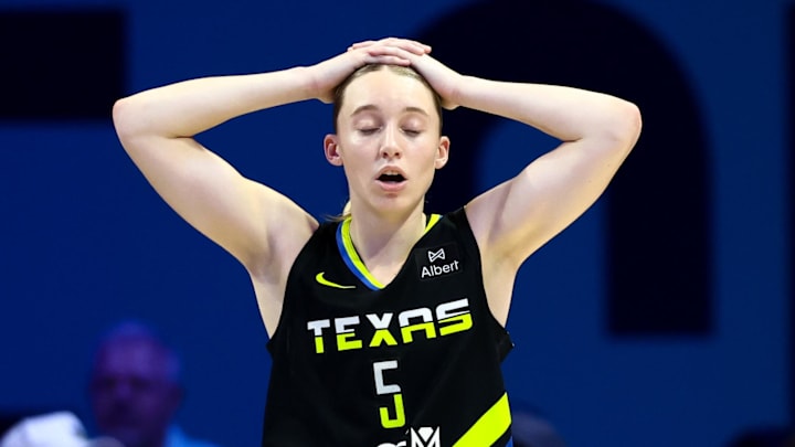 Aug 24, 2025; Arlington, Texas, USA;  Dallas Wings guard Paige Bueckers (5) reacts during the second half against the Golden State Valkyries at College Park Center. Mandatory Credit: Kevin Jairaj-Imagn Images