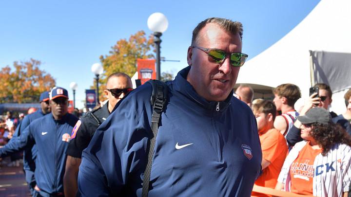 Oct 19, 2024; Champaign, Illinois, USA; Illinois Fighting Illini head coach Bret Bielema leads his team into the stadium before kickoff against the Michigan Wolverines game at Memorial Stadium. Mandatory Credit: Ron Johnson-Imagn Images