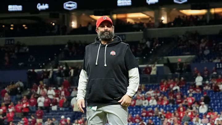 Ohio State Buckeyes defensive coordinator Matt Patricia takes the field for warm ups prior to the Big Ten Conference championship game against the Indiana Hoosiers at Lucas Oil Stadium in Indianapolis on Dec. 6, 2025. Ohio State lost 13-10.
