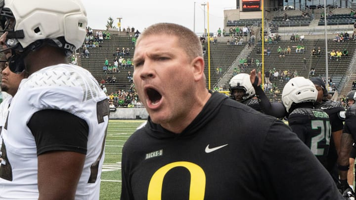 Oregon defensive coordinator Tosh Lupoi directs his players during warmups before the Spring Game at Autzen in Eugene April 26, 2025 Oregon defensive coordinator Tosh Lupoi directs his players during warmups before the Spring Game at Autzen in Eugene April 26, 2025