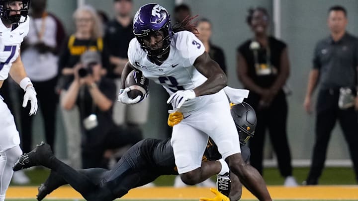 Nov 2, 2024; Waco, Texas, USA; TCU Horned Frogs wide receiver Savion Williams (3) runs the ball as Baylor Bears safety Devyn Bobby (3) defends during the first half at McLane Stadium. Mandatory Credit: Chris Jones-Imagn Images Nov 2, 2024; Waco, Texas, USA; TCU Horned Frogs wide receiver Savion Williams (3) runs the ball as Baylor Bears safety Devyn Bobby (3) defends during the first half at McLane Stadium. Mandatory Credit: Chris Jones-Imagn Images