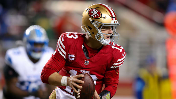 San Francisco 49ers quarterback Brock Purdy looks to pass the ball.