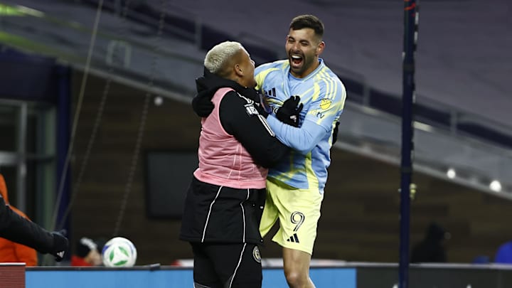 Mar 8, 2025; Foxborough, Massachusetts, USA; Philadelphia Union forward Tai Baribo (9) jumps into a teammates arms after scoring against the New England Revolution during the second half at Gillette Stadium. Mandatory Credit: Winslow Townson-Imagn Images