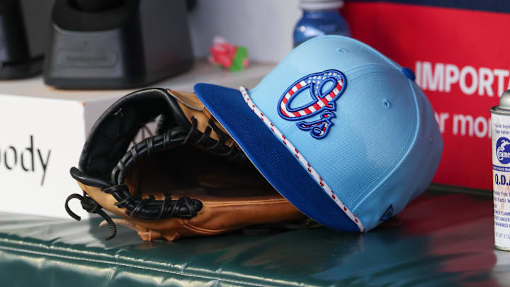 Jul 4, 2025; Atlanta, Georgia, USA; A detailed view of the Baltimore Orioles 4th of July hat in the dugout against the Atlanta Braves in the third inning at Truist Park. 