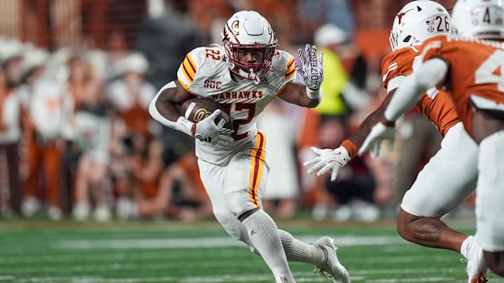 Sep 21, 2024; Austin, Texas, USA;  Louisiana Monroe Warhawks running back Ahmad Hardy (22) runs the ball in the first half against the Texas Longhorns at Darrell K Royal-Texas Memorial Stadium. Mandatory Credit: Daniel Dunn-Imagn Images