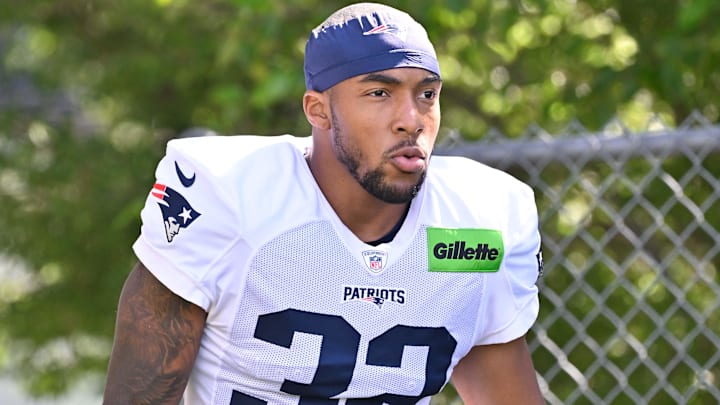 Jul 28, 2025; Foxborough, MA, USA; New England Patriots running back TreVeyon Henderson (32) heads to the practice fields for training camp at Gillette Stadium. Mandatory Credit: Eric Canha-Imagn Images