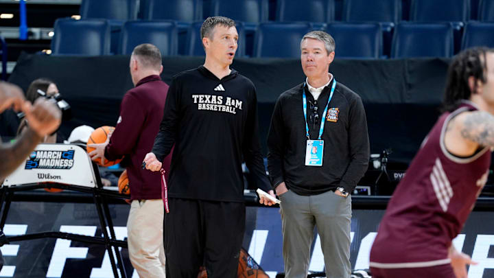 Chad Weiberg, Oklahoma State athletic director, right, talks with Texas A&M coach Bucky McMillan during a Texas A&M practice for the first round of the NCAA basketball tournament at Paycom Center in Oklahoma City, Wednesday, March 18, 2026. Chad Weiberg, Oklahoma State athletic director, right, talks with Texas A&M coach Bucky McMillan during a Texas A&M practice for the first round of the NCAA basketball tournament at Paycom Center in Oklahoma City, Wednesday, March 18, 2026.