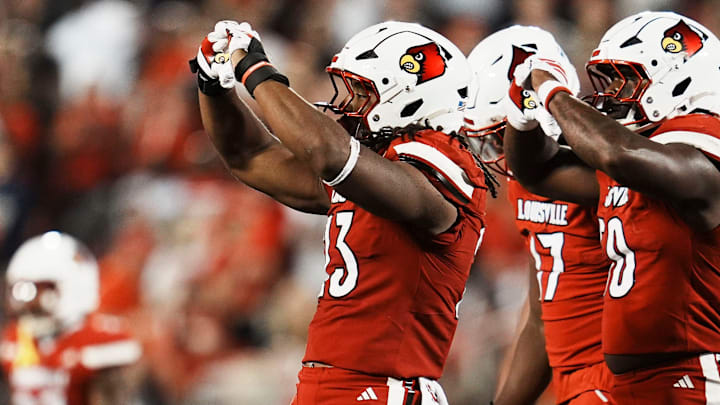 Louisville Cardinals defensive lineman Wesley Bailey (23) makes a heart after his sack against James Madison University in the Card's football game Friday September 5, 2025 at L&N Credit Union Stadium in Louisville, Kentucky.