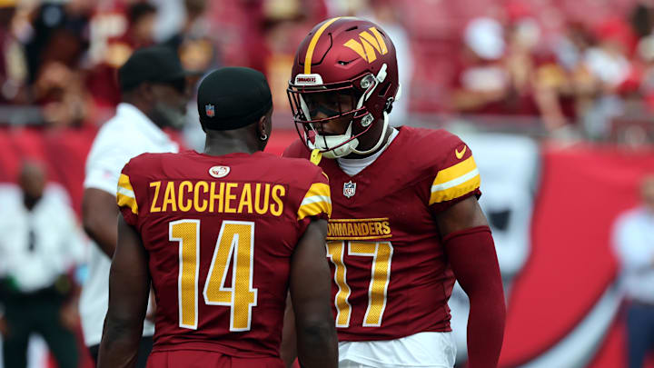 Sep 8, 2024; Tampa, Florida, USA; Washington Commanders wide receiver Terry McLaurin (17) and wide receiver Olamide Zaccheaus (14) talk against the Tampa Bay Buccaneers works out prior to the game at Raymond James Stadium. Mandatory Credit: Kim Klement Neitzel-Imagn Images