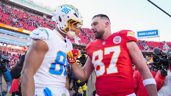 Oronde Gadsden II and Travis Kelce share words. Oronde Gadsden II and Travis Kelce share words.