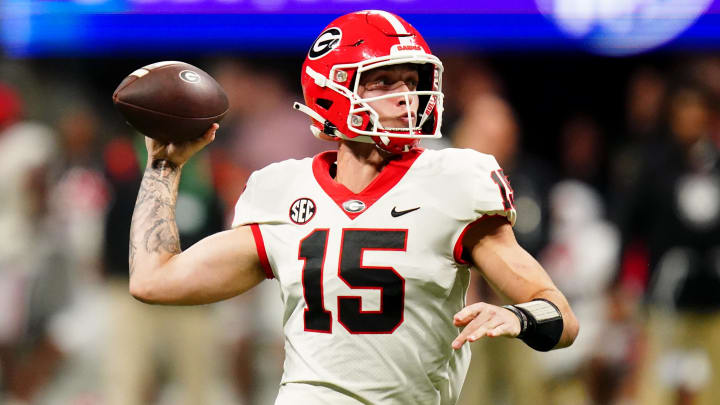 Dec 2, 2023; Atlanta, GA, USA;  Georgia Bulldogs quarterback Carson Beck (15) throws a pass against Alabama Crimson Tide