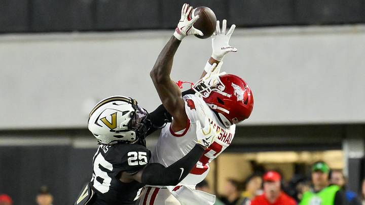 Vanderbilt Commodores safety Mason Lewis (25) breaks up the pass thrown to Arkansas Razorbacks wide receiver Chris Marshall (6) during the first half at FirstBank Stadium. Vanderbilt Commodores safety Mason Lewis (25) breaks up the pass thrown to Arkansas Razorbacks wide receiver Chris Marshall (6) during the first half at FirstBank Stadium.