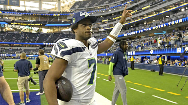 Jan 5, 2025; Inglewood, California, USA; Seattle Seahawks quarterback Geno Smith (7) leaves the field following the game against the Los Angeles Rams at SoFi Stadium. Mandatory Credit: Jayne Kamin-Oncea-Imagn Images