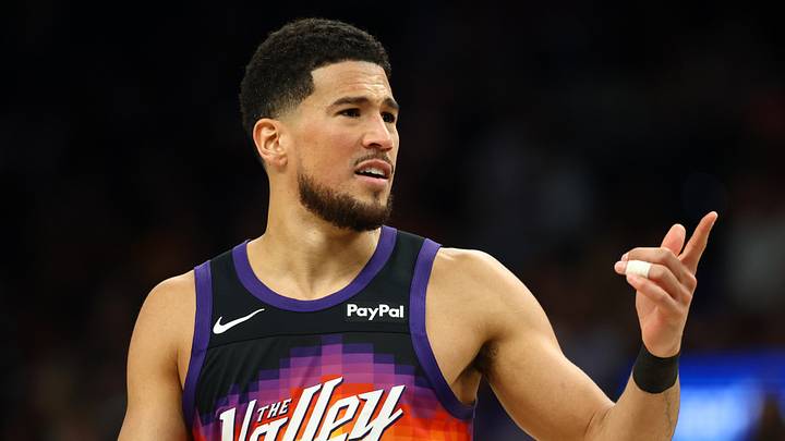 Apr 8, 2026; Phoenix, Arizona, USA; Phoenix Suns guard Devin Booker (1) against the Dallas Mavericks at Mortgage Matchup Center. Mandatory Credit: Mark J. Rebilas-Imagn Images