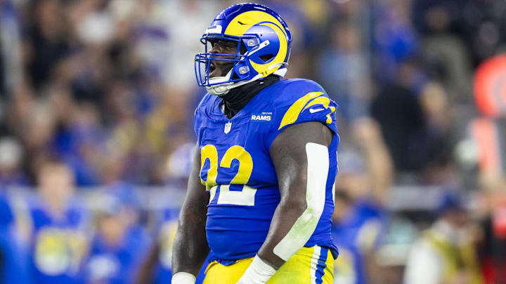 Jan 13, 2025; Glendale, AZ, USA; Los Angeles Rams defensive tackle Neville Gallimore (92) celebrates a play against the Minnesota Vikings during an NFC wild card game at State Farm Stadium. Mandatory Credit: Mark J. Rebilas-Imagn Images